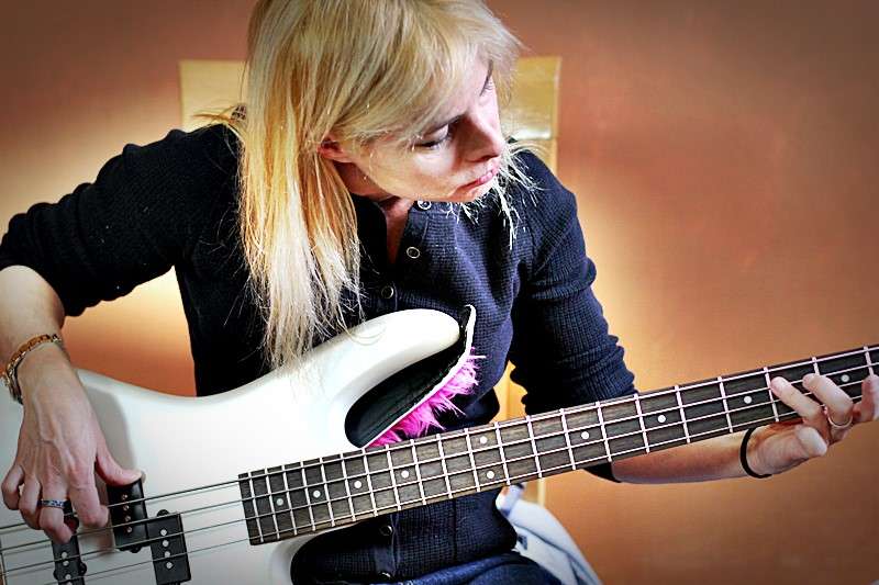 Student Tami at a bass lesson at Make Great Music