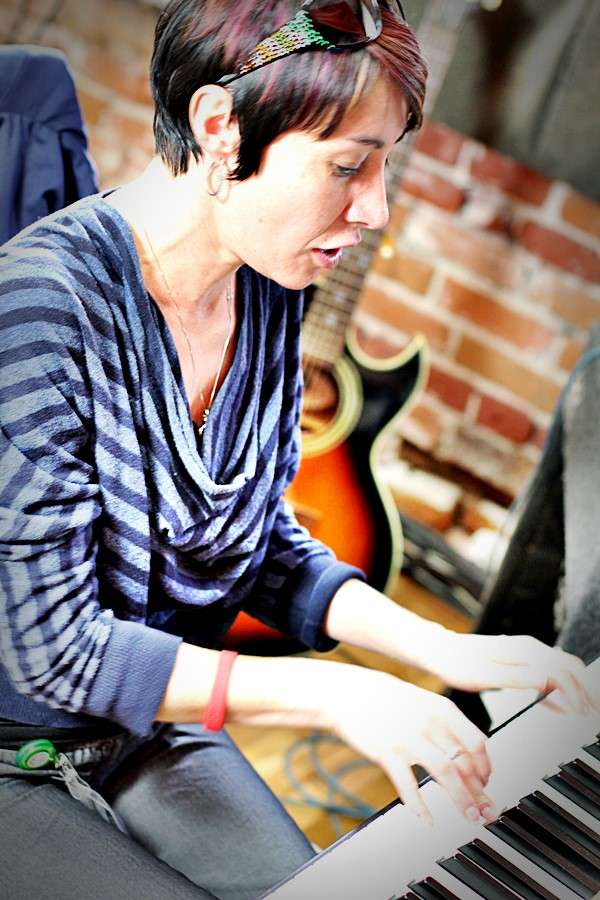 Student Sherry at a piano lesson