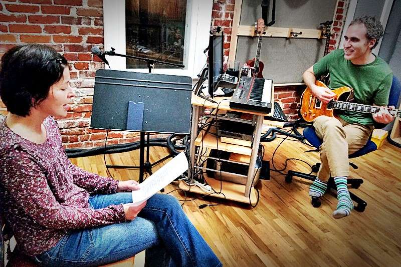 John Shapiro teaching a singing lesson with student Lada